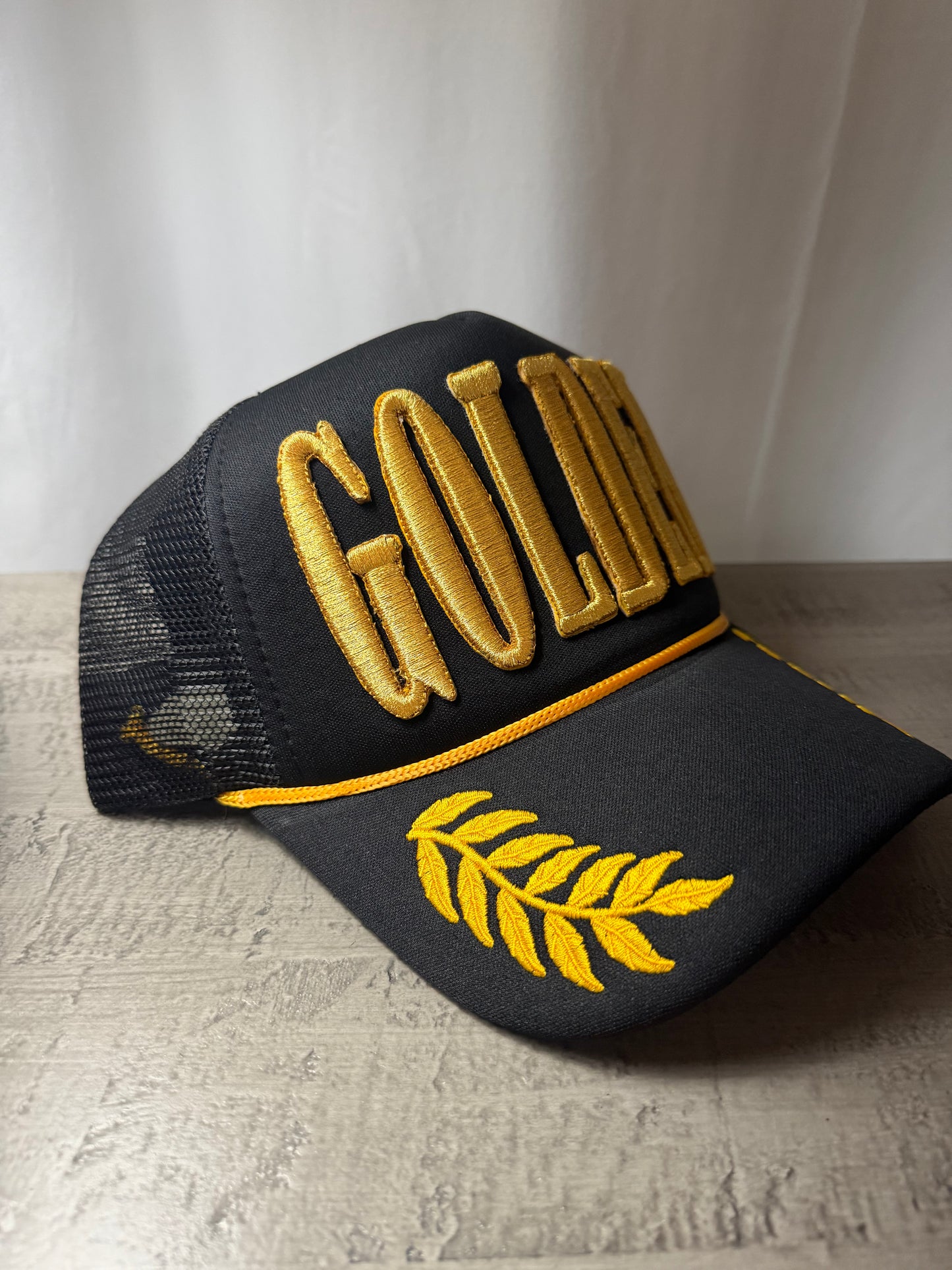 Golden Embroidered Trucker Hat