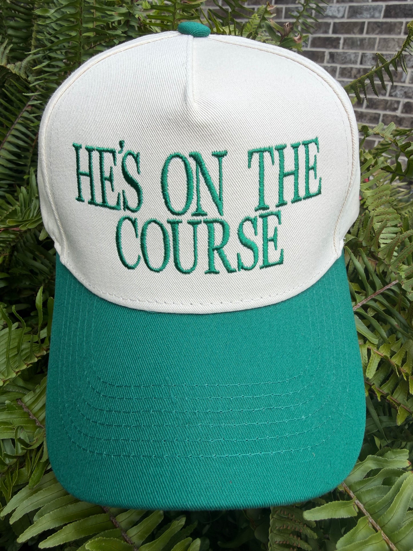 He's On The Course Trucker Hat
